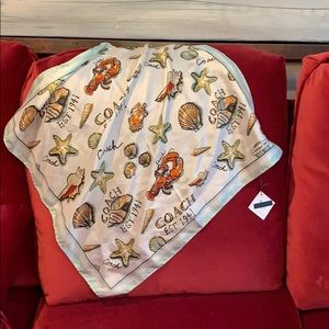 Beach scarf to tie on your rattan purse.